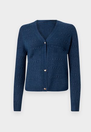 Námořnický modrý cardigan s žebrovanou strukturou, V-výstřihem a pěti zlatými knoflíky ve tvaru srdce na přední straně. Dlouhé rukávy.