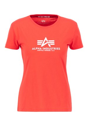 Red short-sleeve T-shirt made of cotton. Features a white graphic logo with "ALPHA INDUSTRIES" text centered on the front. Crew neck design.