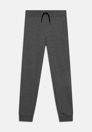 Mørkegrå, tilspidsede joggingbukser med elastisk taljebånd og sort snøre, opsmøgede ankler, lagt fladt på hvid baggrund.