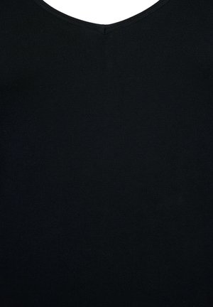 Sort ribbet tanktop med V-udskæring. Stoffet er blødt og strækbart, hvilket giver en tætsiddende silhuet.