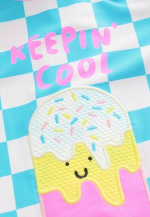 Graphic t-shirt featuring a blue and white checkered background, with a colorful ice cream cone design and the text "KEEPIN' COOL" in pink.