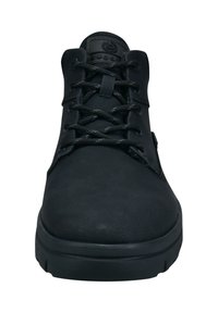 Schwarzer Schnürschuh mit glattem Synthetik-Obermaterial, runder Spitze und Gummisohle. Verfügt über strukturierte Schnürsenkel und ein Markenlabel an der Zunge.