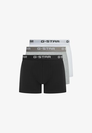 Drei Paar G-Star Boxershorts in Schwarz, Grau und Weiß, mit elastischen Taillenbündchen und Logo. Weicher Stoff, enge Passform und klassisches Design.