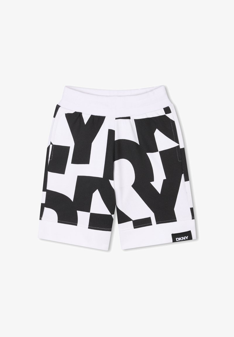 Shorts DKNY noir et blanc avec de grands motifs textuels audacieux. Fabriqués en tissu lisse, ils présentent une taille élastique et une étiquette logo noire.