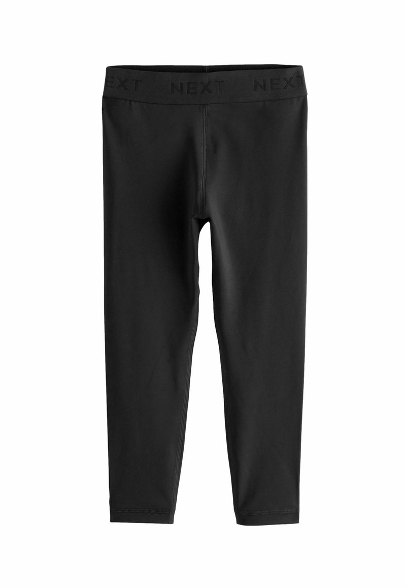 Zwarte leggings gemaakt van rekbaar materiaal met een gladde textuur. Heeft een brede elastische tailleband met de tekst "NEXT" verdiept langs de bovenkant.