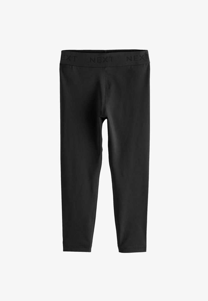 Leggings neri realizzati in tessuto elasticizzato con una superficie liscia. Presentano una ampia vita elastica con la scritta "NEXT" impressa lungo la parte superiore.