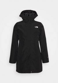 Manteau noir imperméable à capuche avec manches longues, poches avant et logo The North Face sur la poitrine.