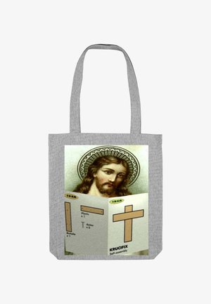 Grijze draagtas met een afbeelding van Jezus met een halo, die montagemanieren voor een houten kruis vast houdt. Tekst in geel en zwart.