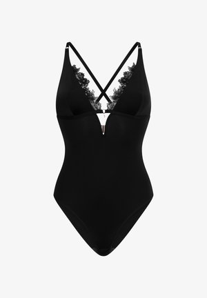 Zwarte bodysuit met een diepe V-hals, kantafwerking langs de halslijn en gekruiste bandjes. Heeft een subtiele uitsnijding aan de voorkant.