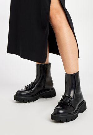 Frau Shoes Botines con plataforma - Black