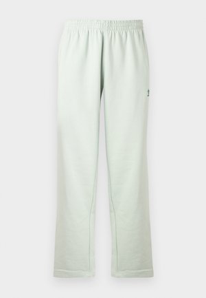 Lichtgroene sweatpants met elastische taille, rechte pijpen en een klein zijlogo op het bovenbeen.