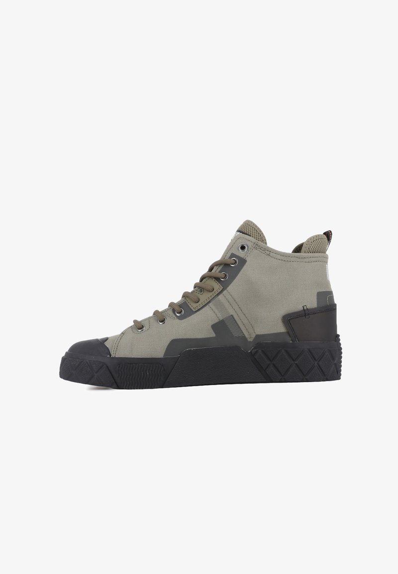High-top sneakers in earthy green canvas with a black rubber toe cap and textured sole. Features metal eyelets and a rear pull tab.
