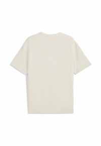 Kratki rukav krem T-shirt s teksturiranom tkaninom, okruglim izrezom i opuštenim krojem sa ravnim rubom. Nema vidljivih oznaka.