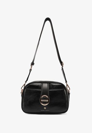 Sac à bandoulière en cuir noir avec boucle circulaire dorée, bandoulière ajustable et logo "Queen Helena" au centre avant.