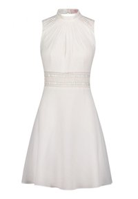 Vit ärmlös klänning med hög krage, plisserad överdel och dekorativ spetsdetalj i midjan. A-linjeformad kjol med en slät yta.