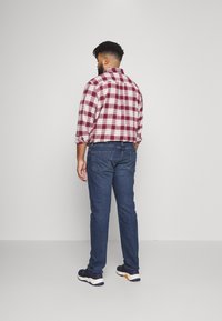 Levi's® Plus Calças de ganga de corte afunilado - dark blue denim