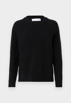 Svart genser laget av myk stoff, med rund hals, lange ermer og en teksturert overflate. Rett kant nederst.