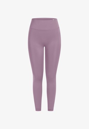 Lila Leggings aus einem glatten, elastischen Stoff. Hohe Taille, knöchellange Ausführung, mit einem minimalistischen Stil ohne Verzierungen.