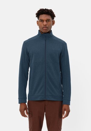 Marineblaues Zip-Jackett aus strukturiertem Stoff, mit hohem Kragen und zwei Fronttaschen. Mit elastischen Bündchen und Saum für eine taillierte Passform.
