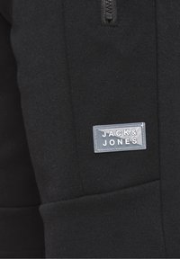 Jack & Jones Junior JJIAIR - Teplákové kalhoty - black