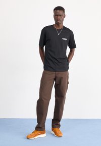 Dickies CARPENTER PANT - Trousers - dark brown
