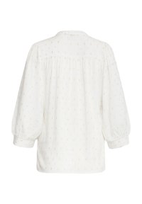 Witte, gestructureerde blouse met pofmouwen, een ronde halslijn en verspreide gouden en zilveren stippenpatronen overal.