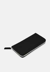 Black leather wallet with a smooth texture, zippered closure, and contrasting silver hardware. Rectangular shape, slim profile.