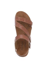 Brown leather sandal with cross straps, padded insole, and buckle detail. Suede-like texture and floral pattern on insole. Open-toe design.