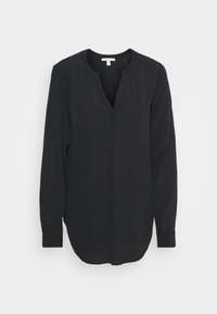 Schwarze Bluse mit langen Ärmeln und V-Ausschnitt, aus weichem Stoff, lockerer Passform und Raffung an den Schultern. Der Saum ist abgerundet und die Ärmel sind mit einem Bündchen versehen.