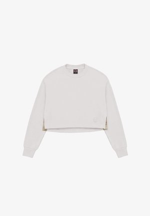Long-sleeve cropped sweatshirt in light beige with round neckline and ribbed cuffs, featuring subtle brand logo near the hem.