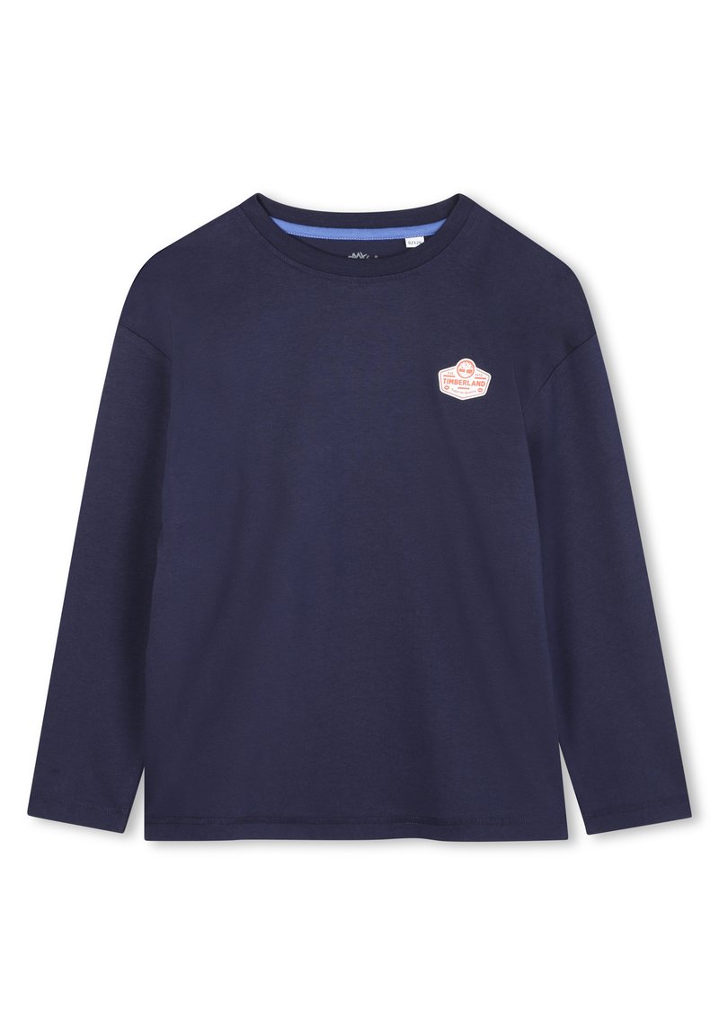 Donkerblauw langemouwen t-shirt van katoen, met een ronde halslijn en een logo patch op de borst. Soepele textuur en eenvoudig ontwerp.