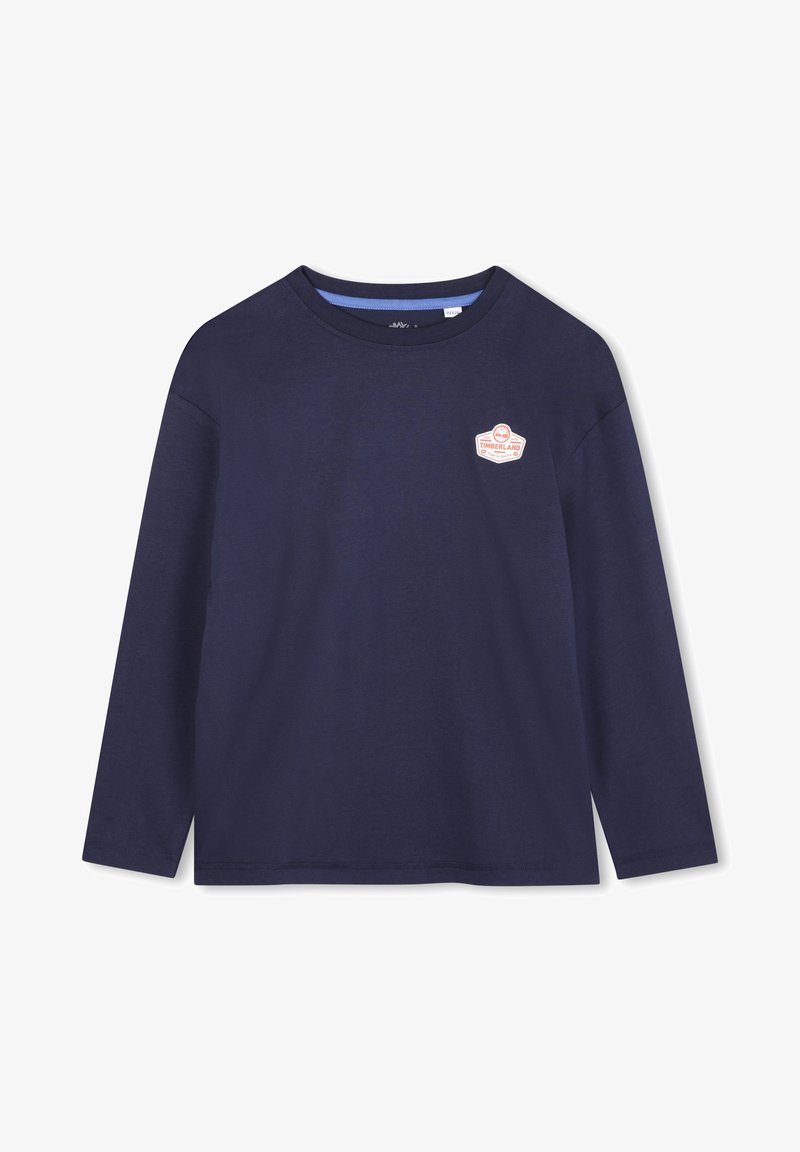 Donkerblauw langemouwen t-shirt van katoen, met een ronde halslijn en een logo patch op de borst. Soepele textuur en eenvoudig ontwerp.