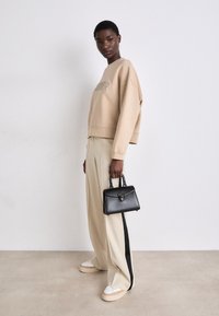 COACH LUXE REFINED SAMMY TOP HANDLE - Sac à main - black