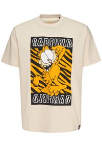 Cremefarvet bomulds T-shirt med et stort sort og orange Garfield grafik samt fed skrift og tigerstribede detaljer.