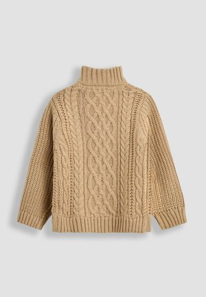 Beige neulepusero, jossa on kaapeliteksti ja ribbikuvio, pitkät hihat ja paksu, lämmin rakenne.