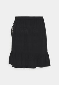 Jupe noire avec une taille élastique, présentant un ourlet froncé, un tissu texturé avec des motifs subtils et des accents en panneaux transparents sur les côtés.