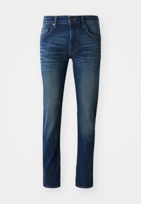 Jean en denim bleu foncé à coupe slim, avec cinq poches, une fermeture à bouton sur le devant et une texture légèrement décolorée sur les jambes.