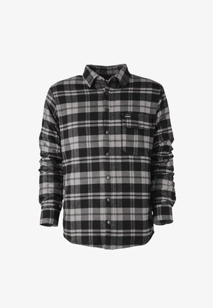 Camicia in flanella a quadri nera e grigia con chiusura a bottoni, maniche lunghe e tasca sul petto. Texture morbida e design casual.