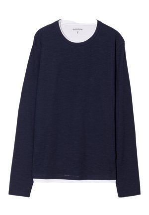 Maglietta a maniche lunghe blu navy con scollo rotondo e colletto interno bianco. Realizzata in un materiale strutturato con orlo dritto e maniche con polsini.