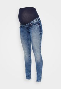 Graviditetsjeans i medelblå denim, med en stretchig svart panel för magen, smal passform, lätt slitningar vid knäna och traditionell femfickorsdesign.