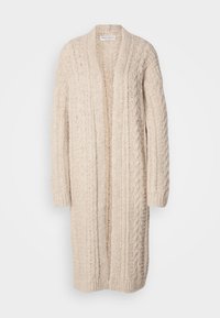 Cardigan lungo e aperto davanti in morbido knit beige. Presenta cavi testurizzati e coste. Maniche ampie con polsini a maglia. Senza chiusure.