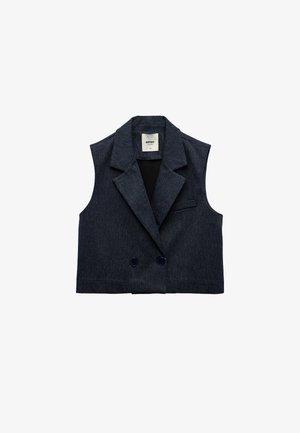 Marineblå denim ærmeløs blazer med reverskrave, dobbeltknaplukning og en enkelt brystlomme. Glat, robust tekstur.