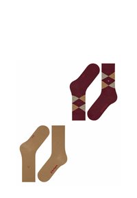Brązowe i burgundowe skarpetki w wzory w romby. Brązowa skarpetka jest jednokolorowa; burgundowa skarpetka ma wzór w romby z akcentami.