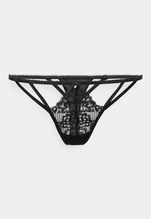 Must mustrist lakk, millel on keerukad lillemustrid, peened rihmad ja dekoratiivne metalldetail selja keskosas.