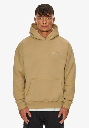 Khaki hoodie made of soft fabric with a front pocket, drawstring hood, and subtle white embroidered logo on the chest. Relaxed fit.
