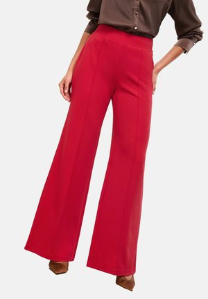 Red wide-leg pants made of smooth fabric with a high waist. Features vertical seams, floor-length cut, and a flat front design.
