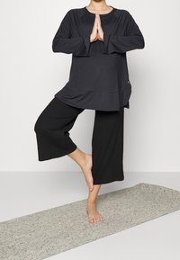 Puma Langarmshirt - black