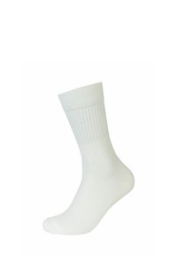 Calzino bianco alla caviglia realizzato in un materiale testurizzato ed elastico, con dettagli a costine lungo il polsino e corpo liscio.