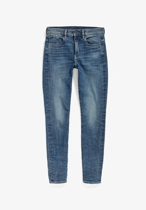 Blå denimjeans med rett ben-design, falmet finish, fem lommer og metallknapp-lukking. Har subtile sømdetaljer.