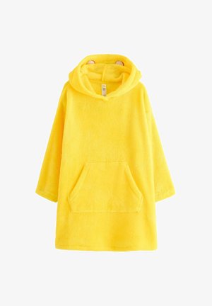 Světle žlutý plyšový kabát s kapucí a přední klokaní kapsou, s malýma ušima zvířete na kapuci, vystavený na bílém pozadí.